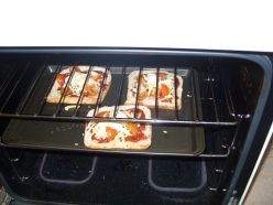 Pizza Toast in the oven, ready to cook.