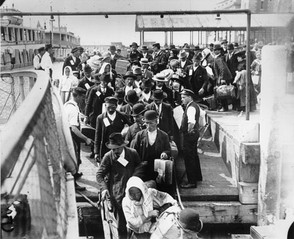 immigrants getting off boat
