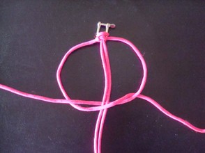 Now repeat but this time curl the left hand cord over the stationary cords,weave the left hand cord over,under,through