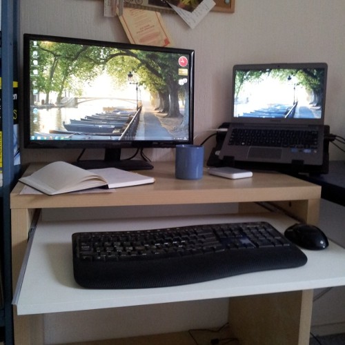 My laptop setup. The laptop itself is on the right, external screen left etc.