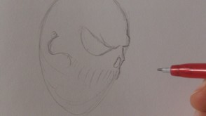 Now draw in the skulls nose, mark in the teeth and cheek bone.