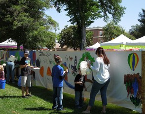 Everyone enjoys working on the public mural each year.
