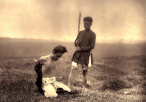 Image: Unknown man being executed in Viet Nam (1885).