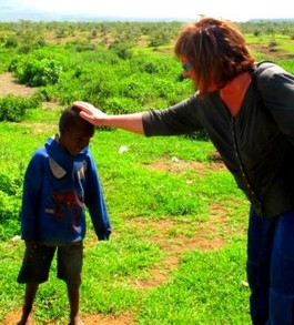 Maasai Child Greeting Adult