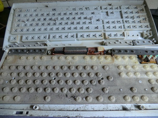Image:  Under the lid of a keyboard.