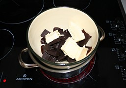 Melt the chocolate and butter over simmering water