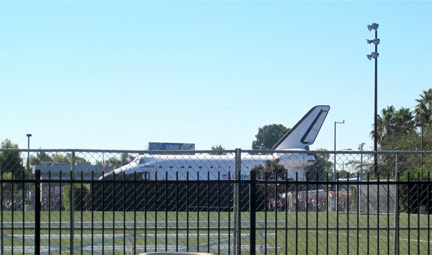 At 10:50, Endeavour inches into view on MLK Jr Blvd