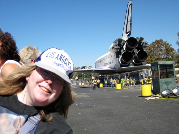 Someone kindly snaps my photo with the Endeavour.