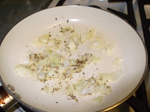 When the margarine has melted, add the thyme and the onions
