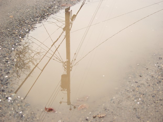 Powerpole in puddle