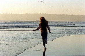 Coronado Beach Long Haired Woman Running Dusk