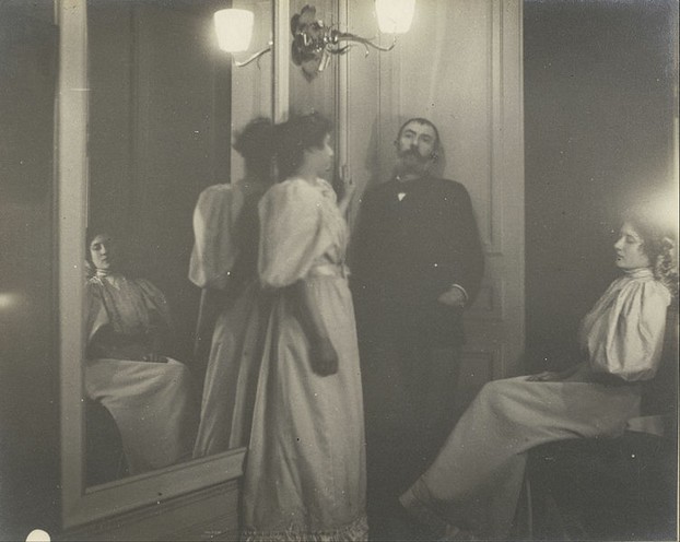 Portrait of Henry Lerolle with two of his daughters, Yvonne and Christine and a mirror