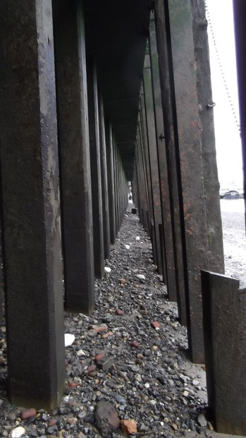 Under the pier on the Thames foreshore