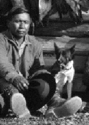 A Tahltan man with his Bear Dog.