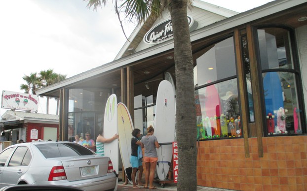 Rent surfboards, buy food, or shop for gifts, along Flagler Ave.