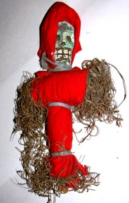Cursed Voodoo doll made from the intended target's clothing