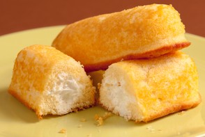 Twinkies are a cake-y cream filled sugary junk food snack.