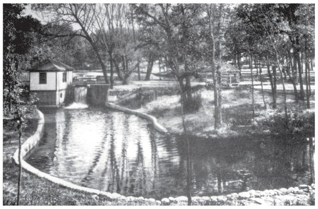 ca. 1910 photo of water-driven turbine built at east side of dam by L.D. Nichols in 1900s to electrify the site