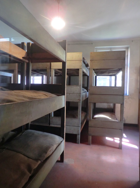 Image: Men slept three to a bunk in these Auschwitz I barracks.