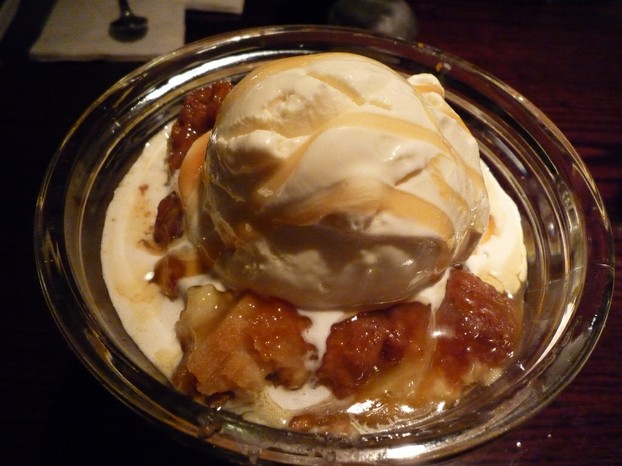 Apple dump cobbler, topped with melting ice cream, is lusciously delicious.