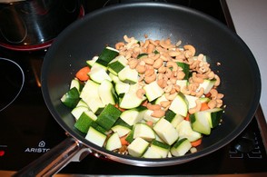 Add diced veggies to wok