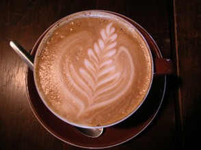 Cappuccino with fern motif.