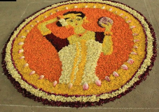 Floral design of a young lady in pookkalam
