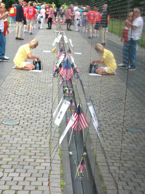 Leaving Tributes at the Vietnam Veterans Memorial Wall