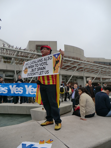 Image: Catalan Independence campaigner on camera before the Scottish Parliament Building