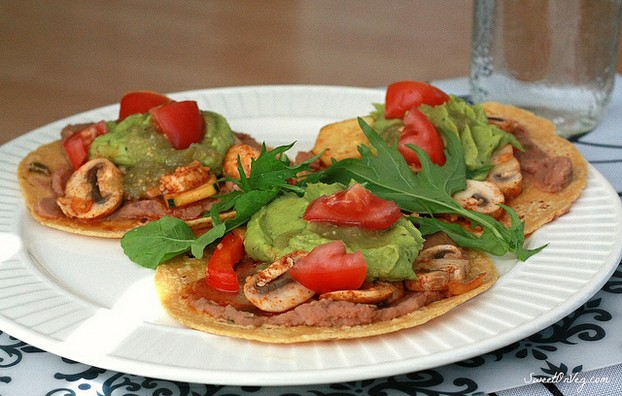 Veggie tacos with mushrooms, beans and guacamole