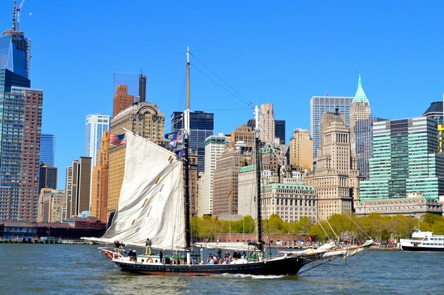 No, you don't get to ride a sailboat on the Circle Line. But you very likely may pass a couple as you cruise along...