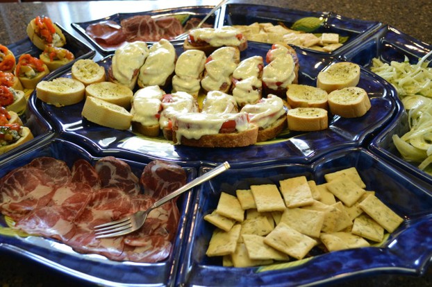 Plate of crostini and marinated salads
