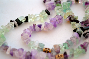 Light-colored fluorite chips make a pretty necklace with onyx and sterling silver.