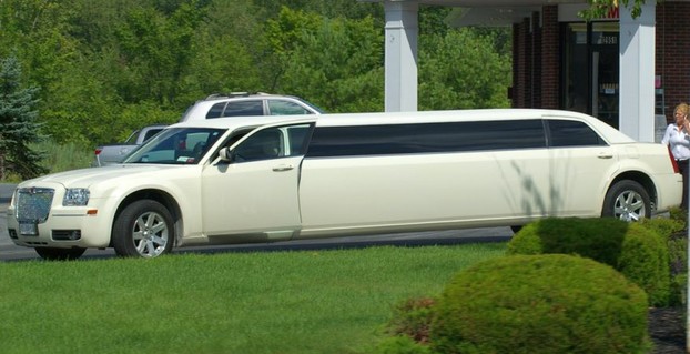 white Chrysler 300C limousine