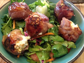 Prosciutto-wrapped figs with goat cheese.