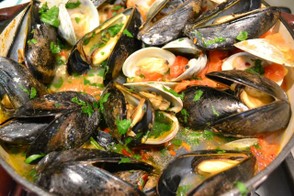 Clams and mussels in a white wine broth.