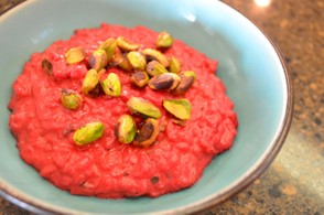 Beet and goat cheese risotto topped with pistachios.