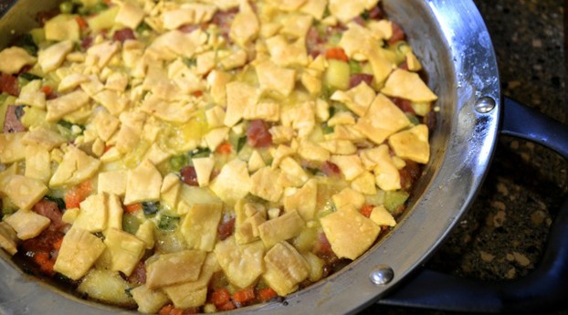 Take the pan stove-top to oven to make a quick and easy turkey "pot pie" using leftover cooked turkey and fresh veggies