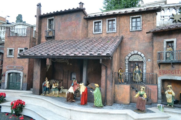 An elaborate creche on top of the Spanish Steps, set up to resemble a small village.