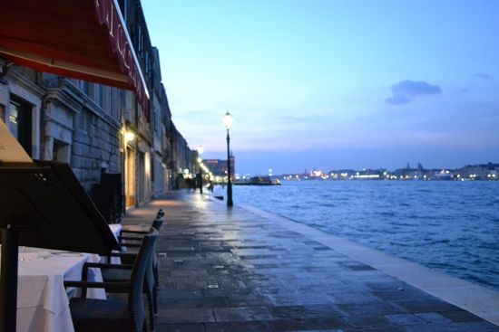 Travel to the Giudecca, where one can enjoy the best views of Venice and a lovely evening meal as the sun sets