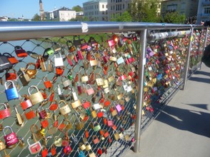 Bridge over the Salzach River adorned with Lovers' Locks