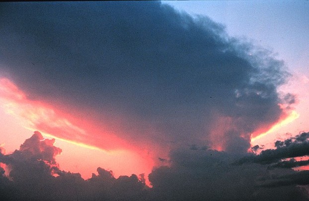 Thunderstorm anvil at sunset