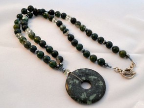 Moss agate used with a tree agate pendant disc