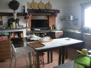 The rustic kitchen of the restaurant - typical rural Italy.