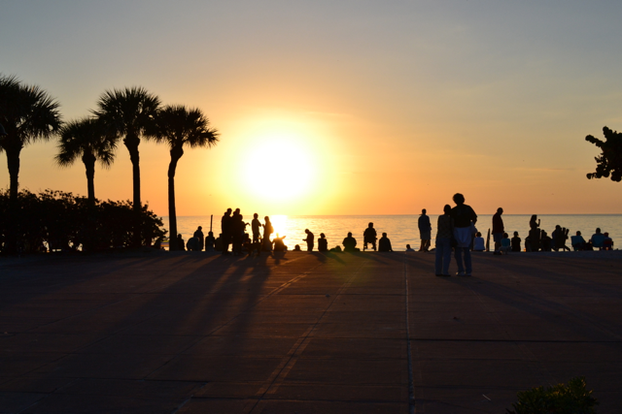 People gather in one spot at Pass-a-Grille beach for perfect sunset views.