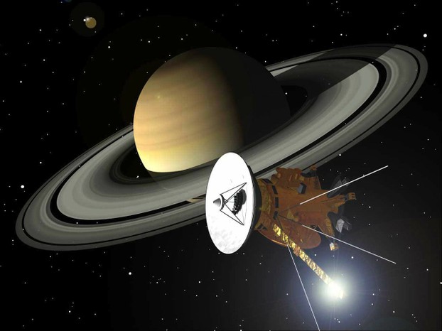 The Cassini unmanned spacecraft orbits Saturn, collects data, and sends it back to earth