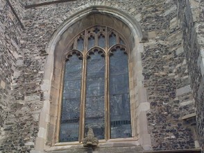 Arched window above the door