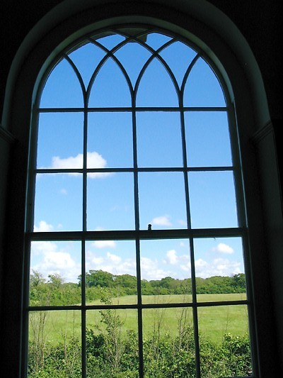 Newtown Town Hall, viewed through the window to the fields beyond