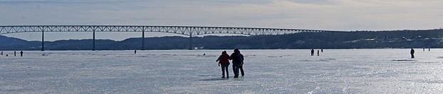 Kingston-Rhinecliff Bridge and walkers on frozen Hudson River