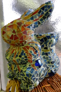Paper mache object covered in glass